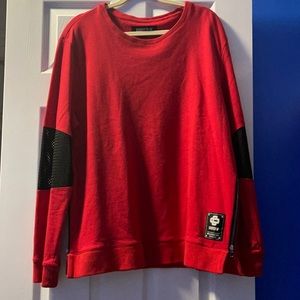 Courtesy of sweater with zippers on the sides